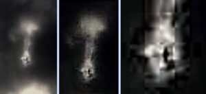 Odd-shaped UFO in dark cloud above Manchester, England