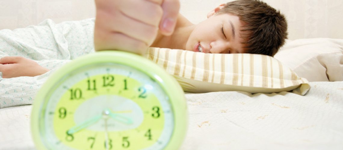 Boy-Tired-Bed-Alarm.jpg