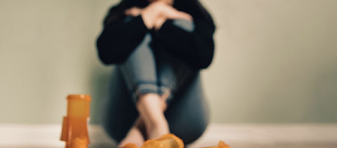 Caucasian-female-contemplating-take-prescription-pills-1.jpeg