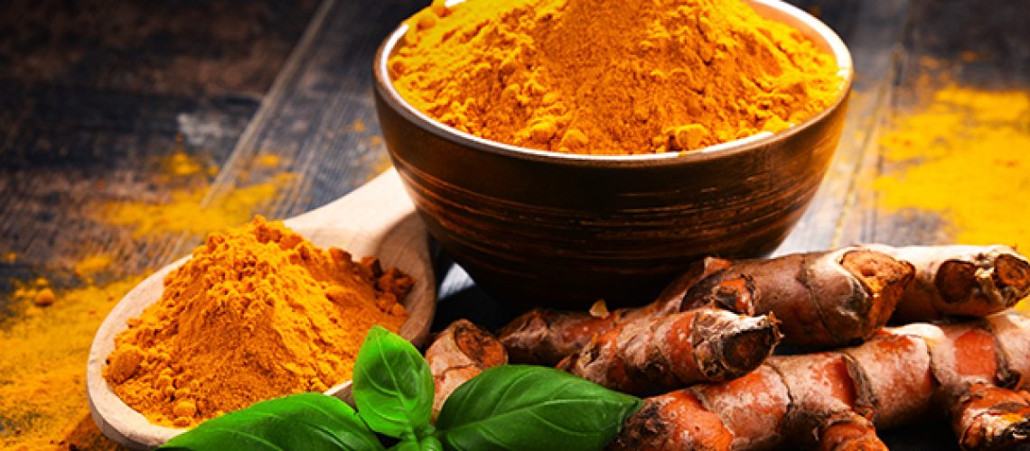 Composition-with-bowl-of-turmeric-powder-1.jpeg