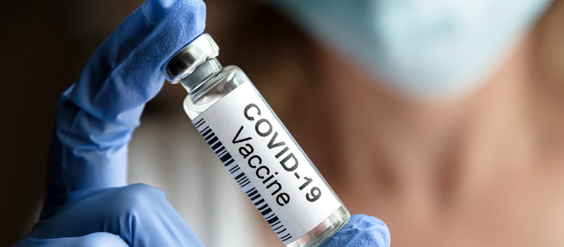 Coronavirus-Covid-19-Nurse-Vaccine-Vial.jpg