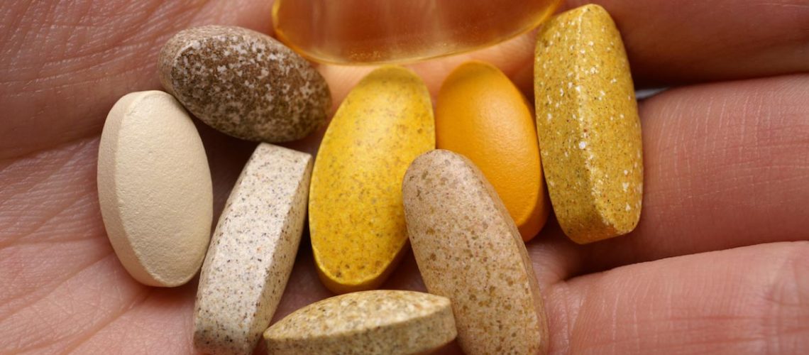 Hand-Supplements-Vitamins.jpg