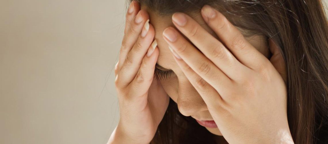 Headache-Woman-Hands.jpg
