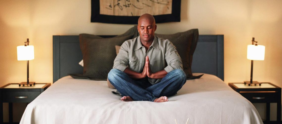 Man-Pray-Bedroom-Bed-Meditate.jpg