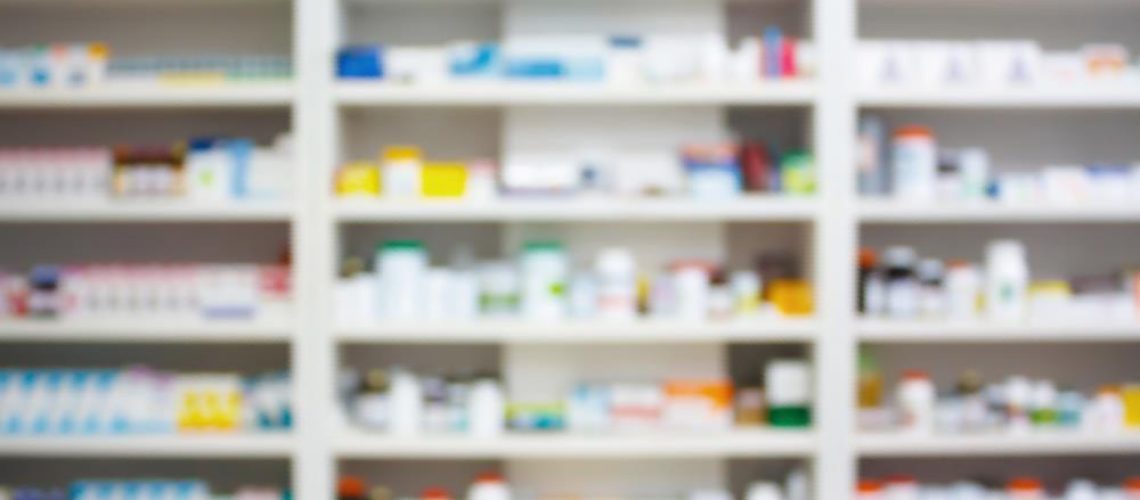Pharmacy-Background-Drugstore-Drug-Counter-Over-Medicine.jpg