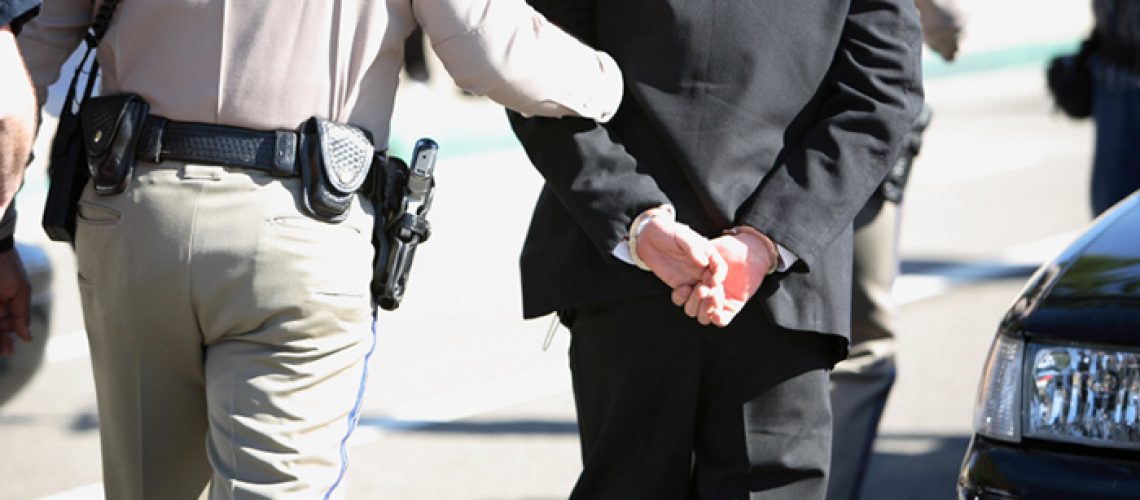 Police-Arrest-DUI-Businessman-Handcuffs.jpg