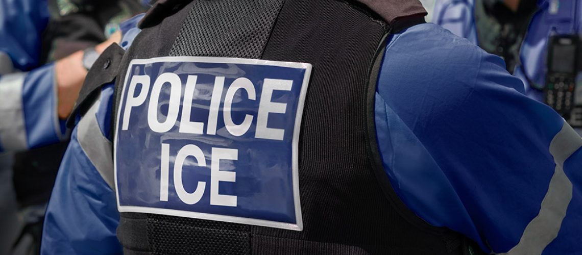 Police-Officer-ICE-Deport-Border.jpg