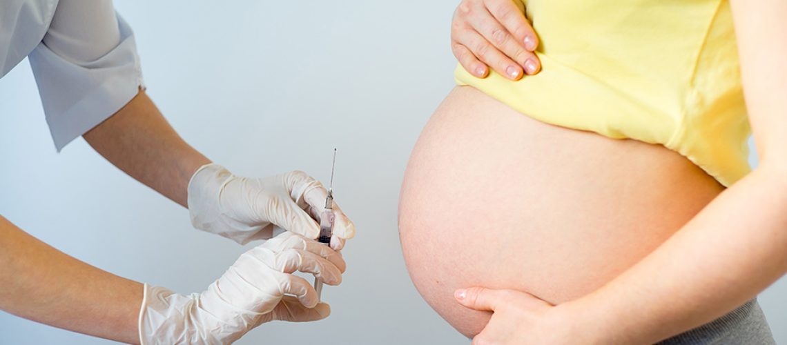 Pregnant-Stomach-Vaccine-Syringe.jpg