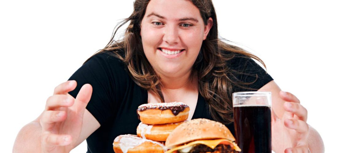 Woman-Eating-Junk-Food-Happy-Fat-Overweight.jpg