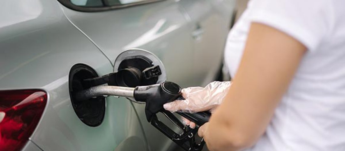 Woman-is-refueling-at-gas-station-1.jpg
