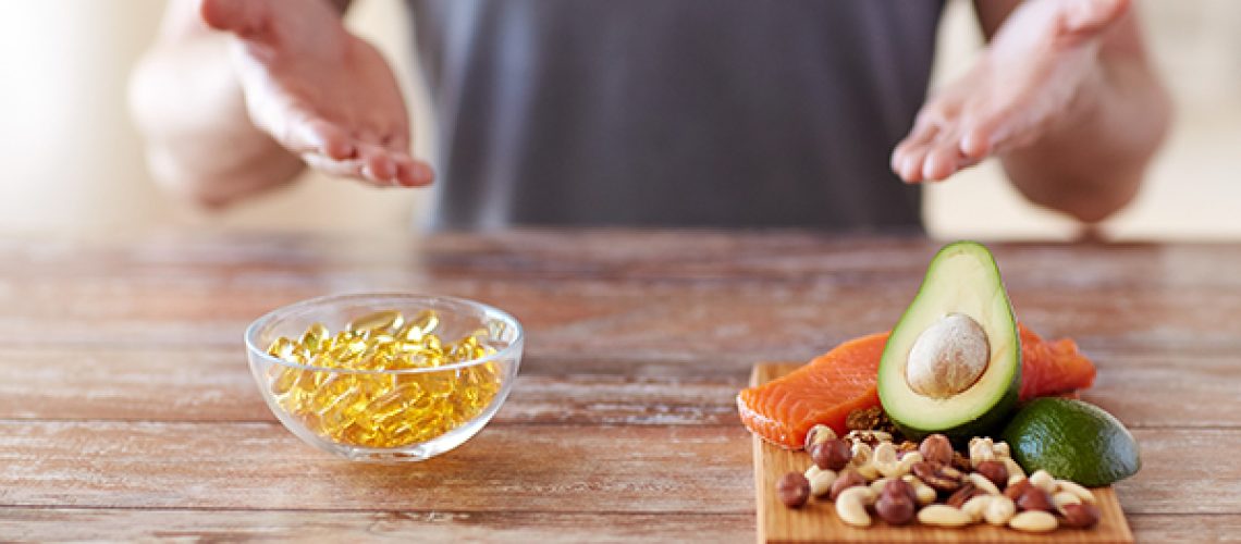close-up-of-male-hands-with-food-rich-in-protein-1.jpeg