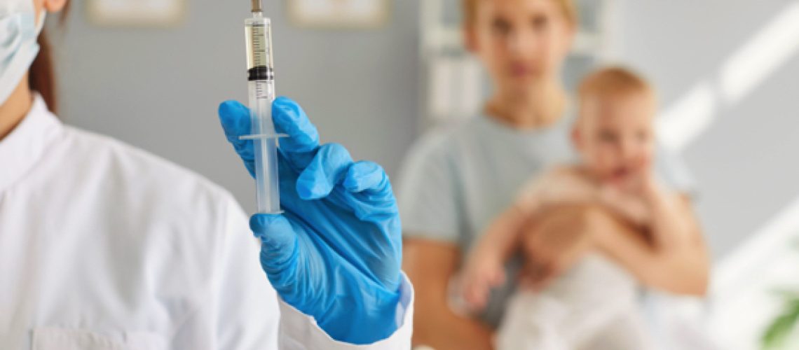 female-professional-nurse-doctor-with-flu-coronavirus-vaccine-1.jpg